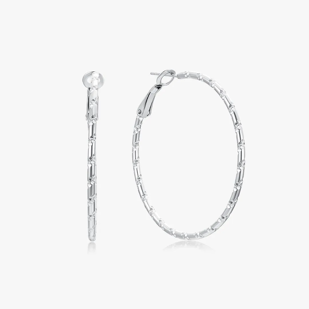 Thin Bamboo Large Silver Hoops sold by Flaire & Co.