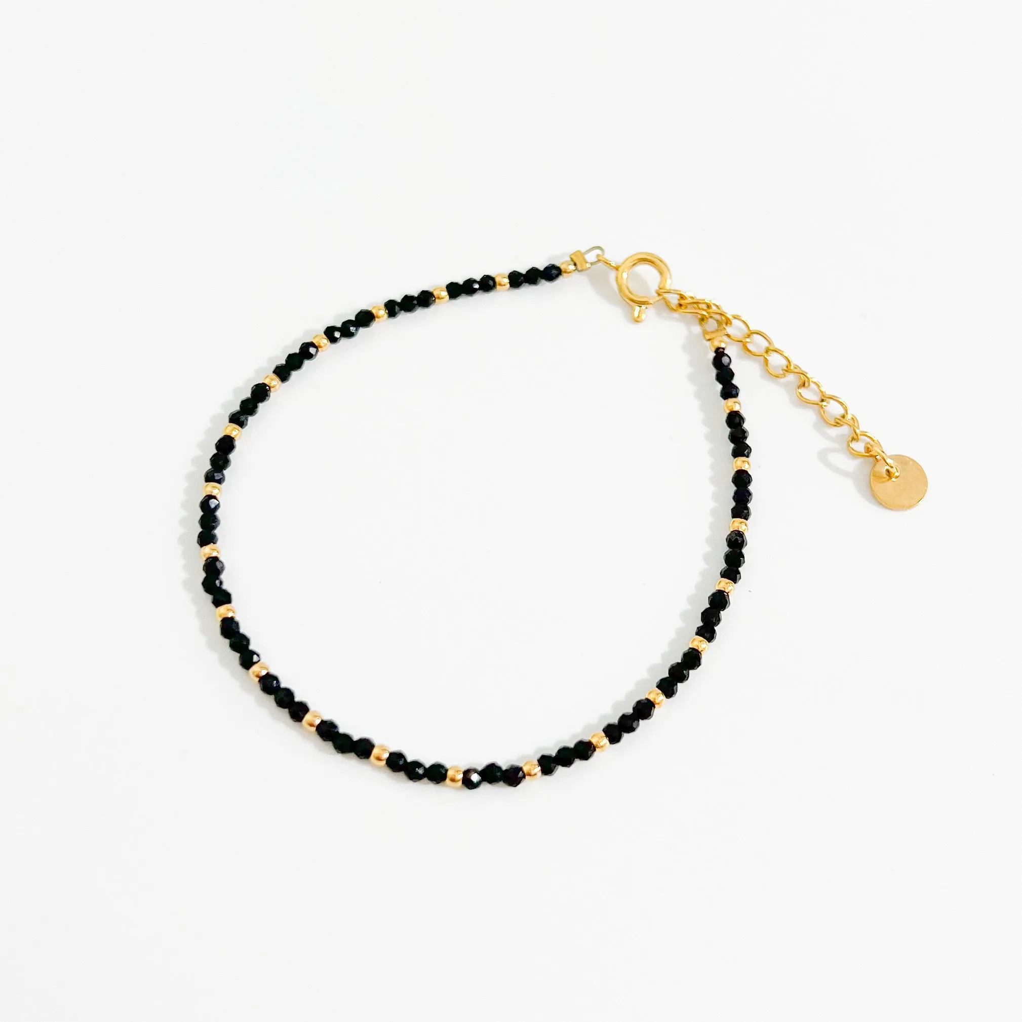 Black Bead Bracelet in Gold sold by Flaire & Co.