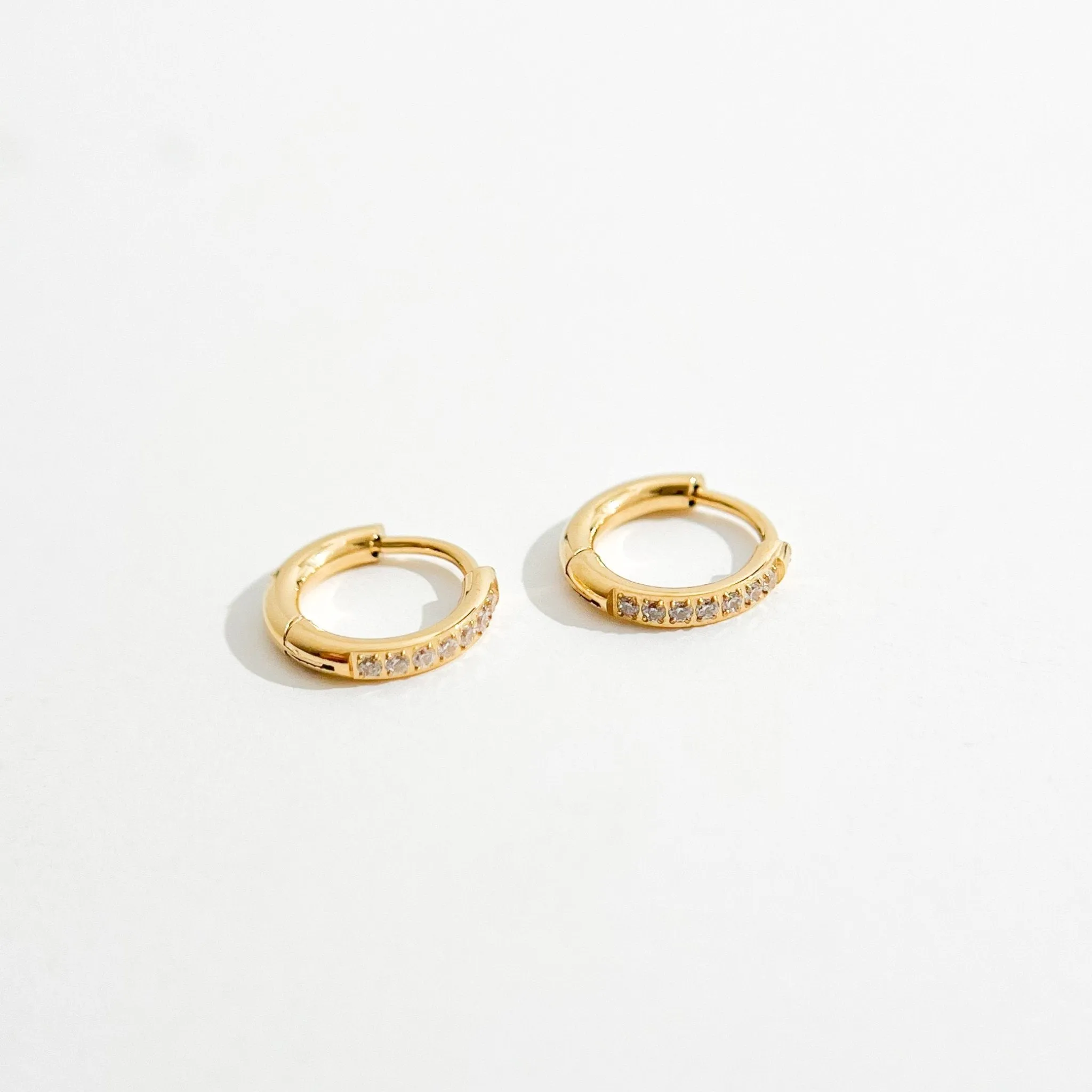 Crystal Huggie Gold Hoops sold by Flaire & Co. product image thumbnail 3
