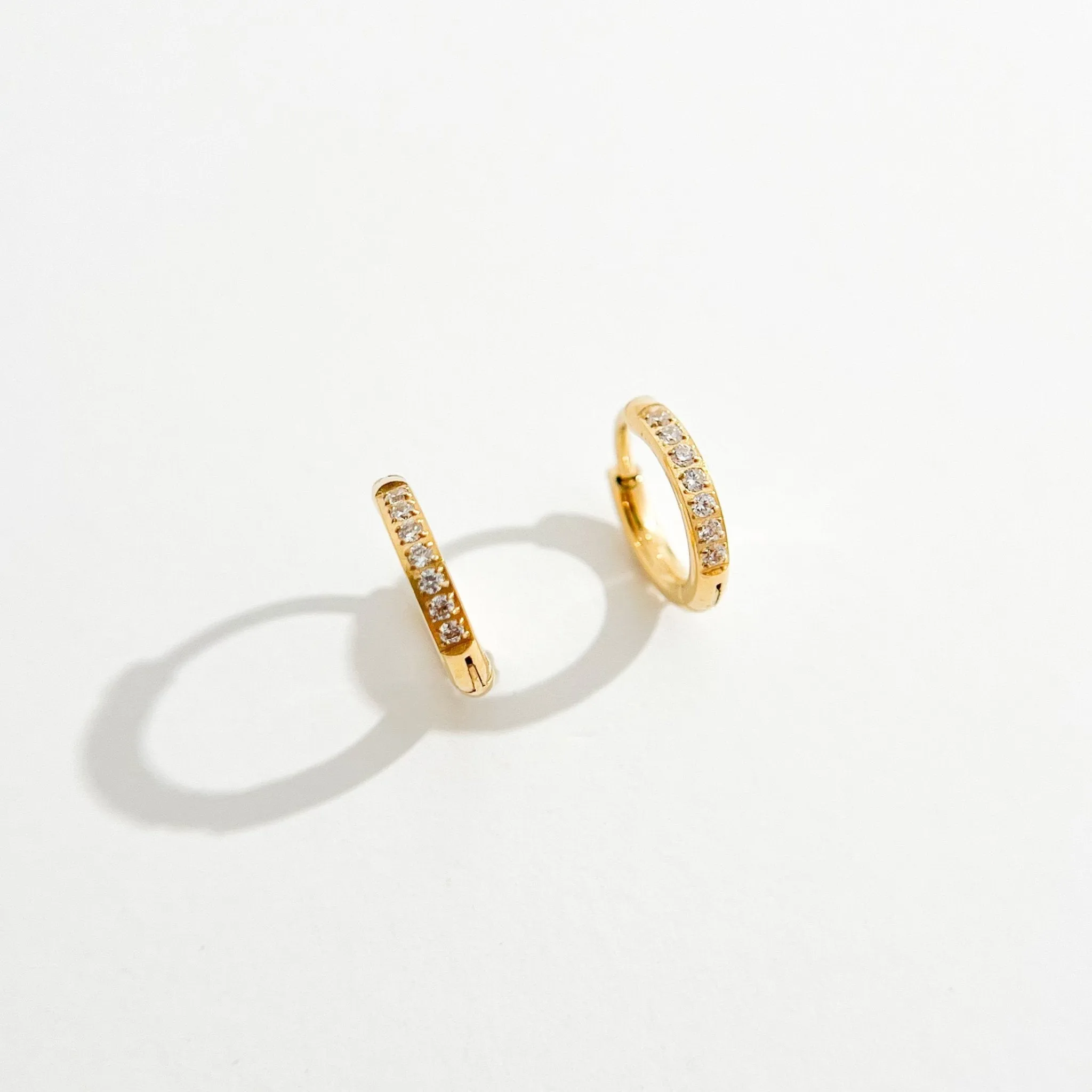 Crystal Huggie Gold Hoops sold by Flaire & Co. product image thumbnail 4