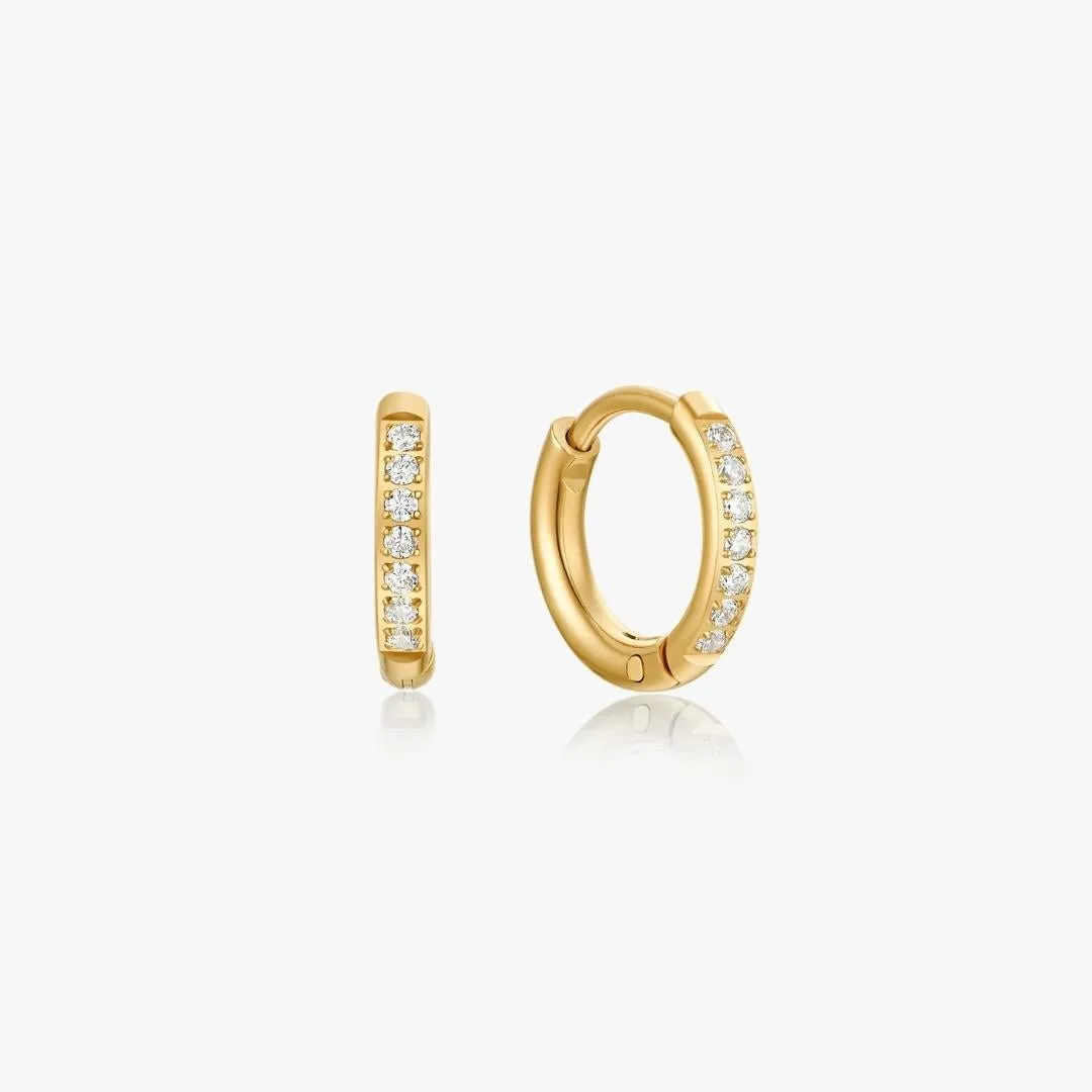 Crystal Huggie Gold Hoops sold by Flaire & Co.