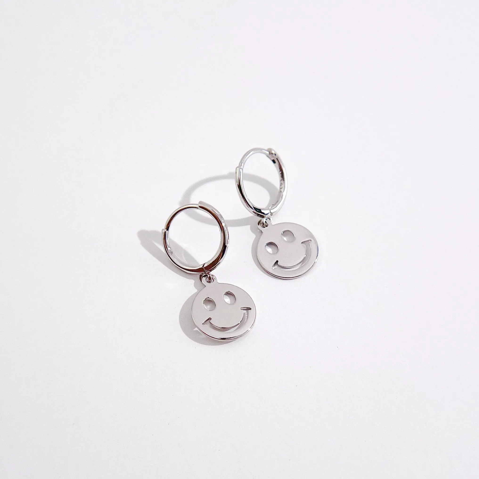 All Smiles Huggies in Silver sold by Flaire & Co.