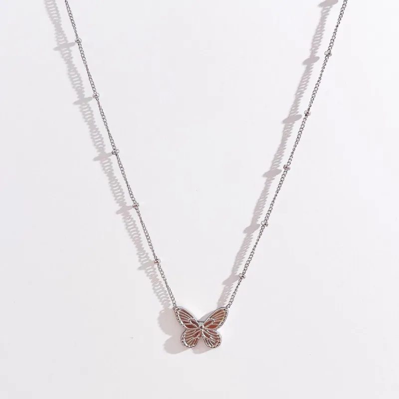 Butterfly Necklace in Silver sold by Flaire & Co.