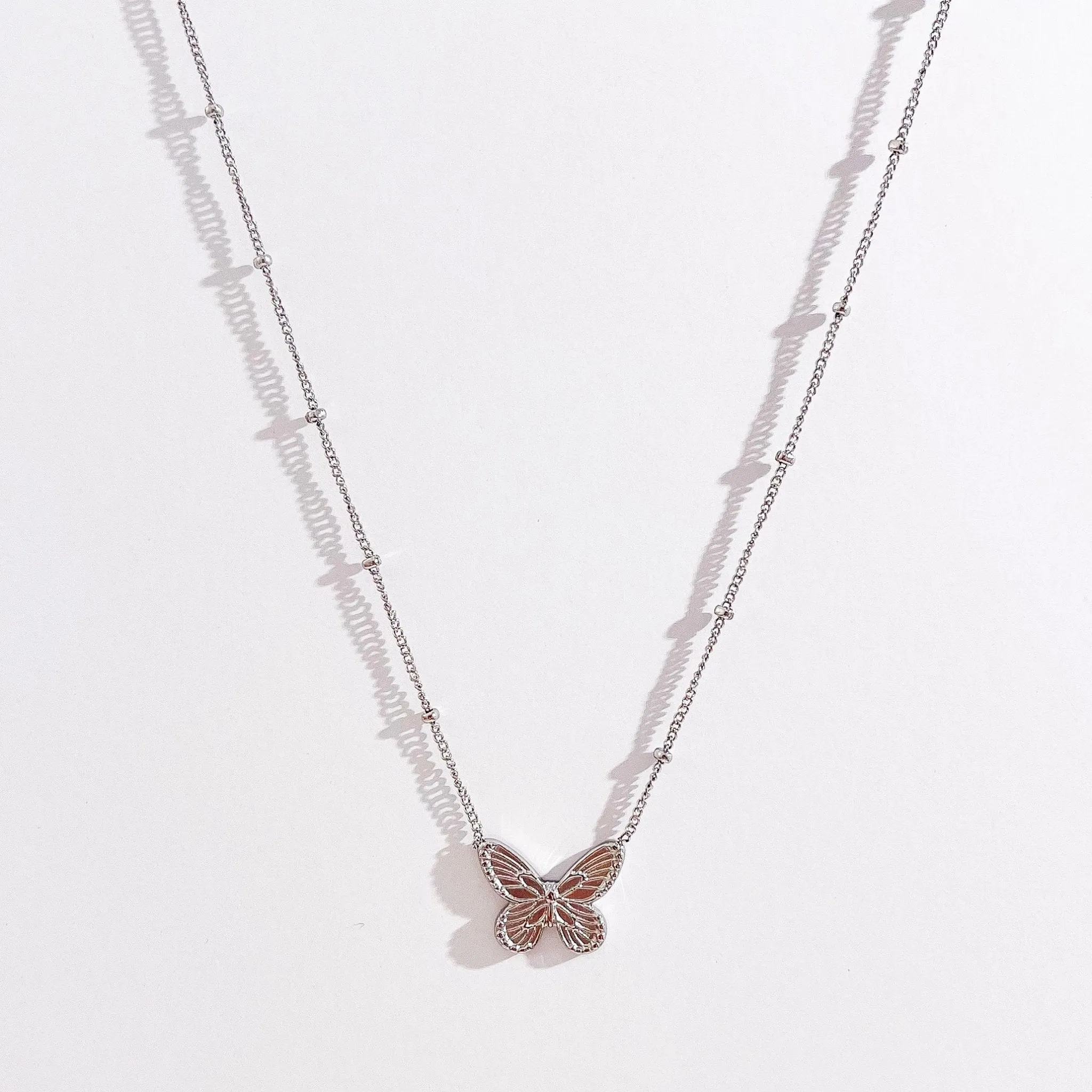 Butterfly Necklace in Silver sold by Flaire & Co.