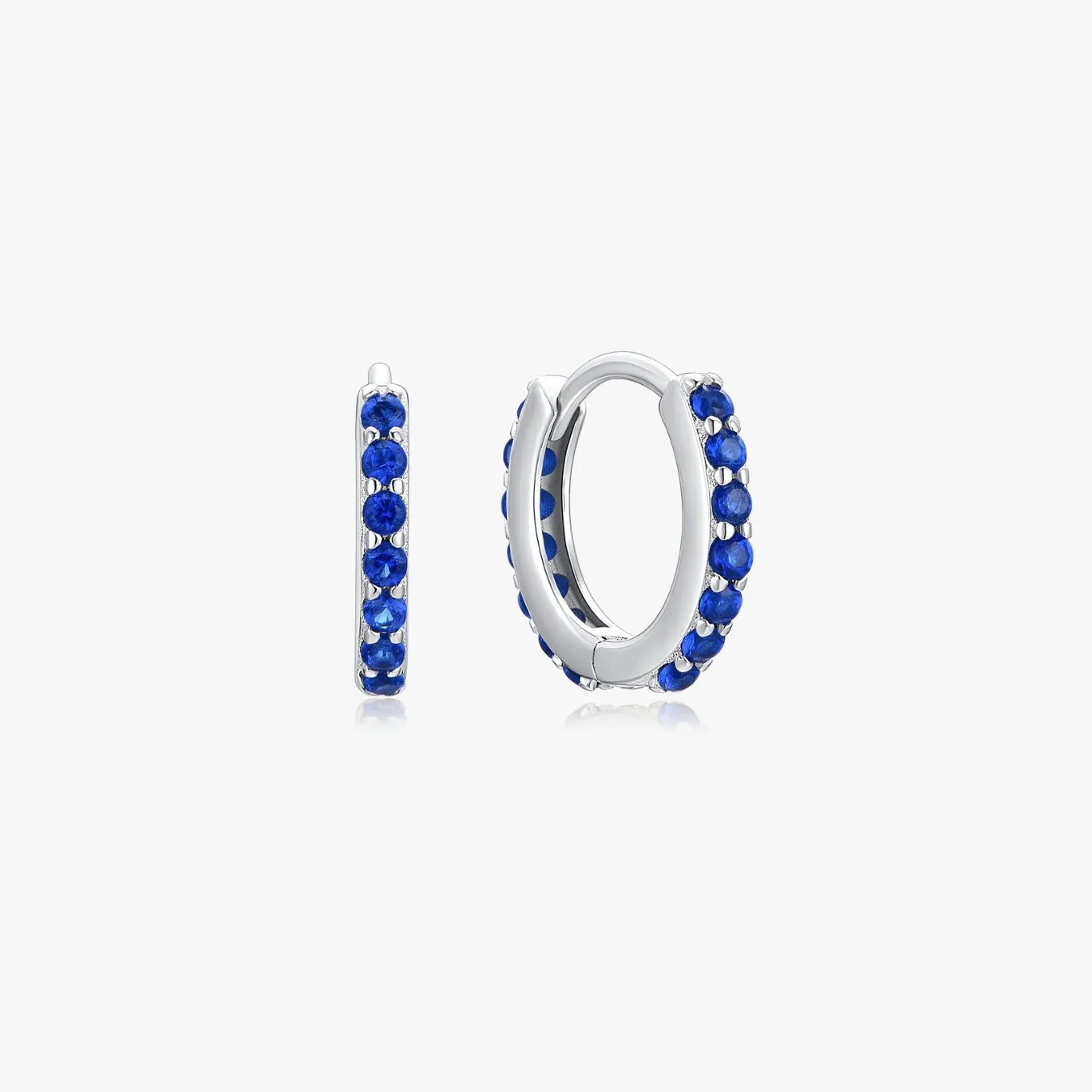 Blue Gems Huggies in Silver sold by Flaire & Co.