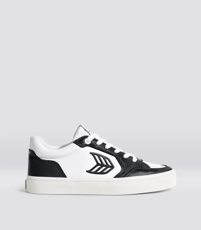 VALLELY White Leather Black Accents Sneaker Women sold by Cariuma