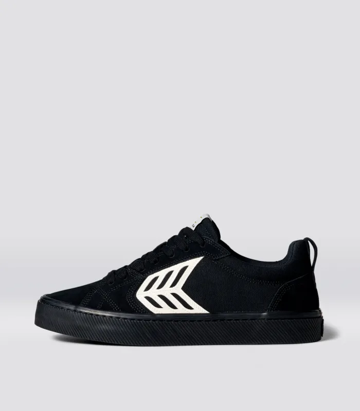 CATIBA PRO Low All Black Suede and Canvas Ivory Logo Sneaker Men Left sold by Cariuma