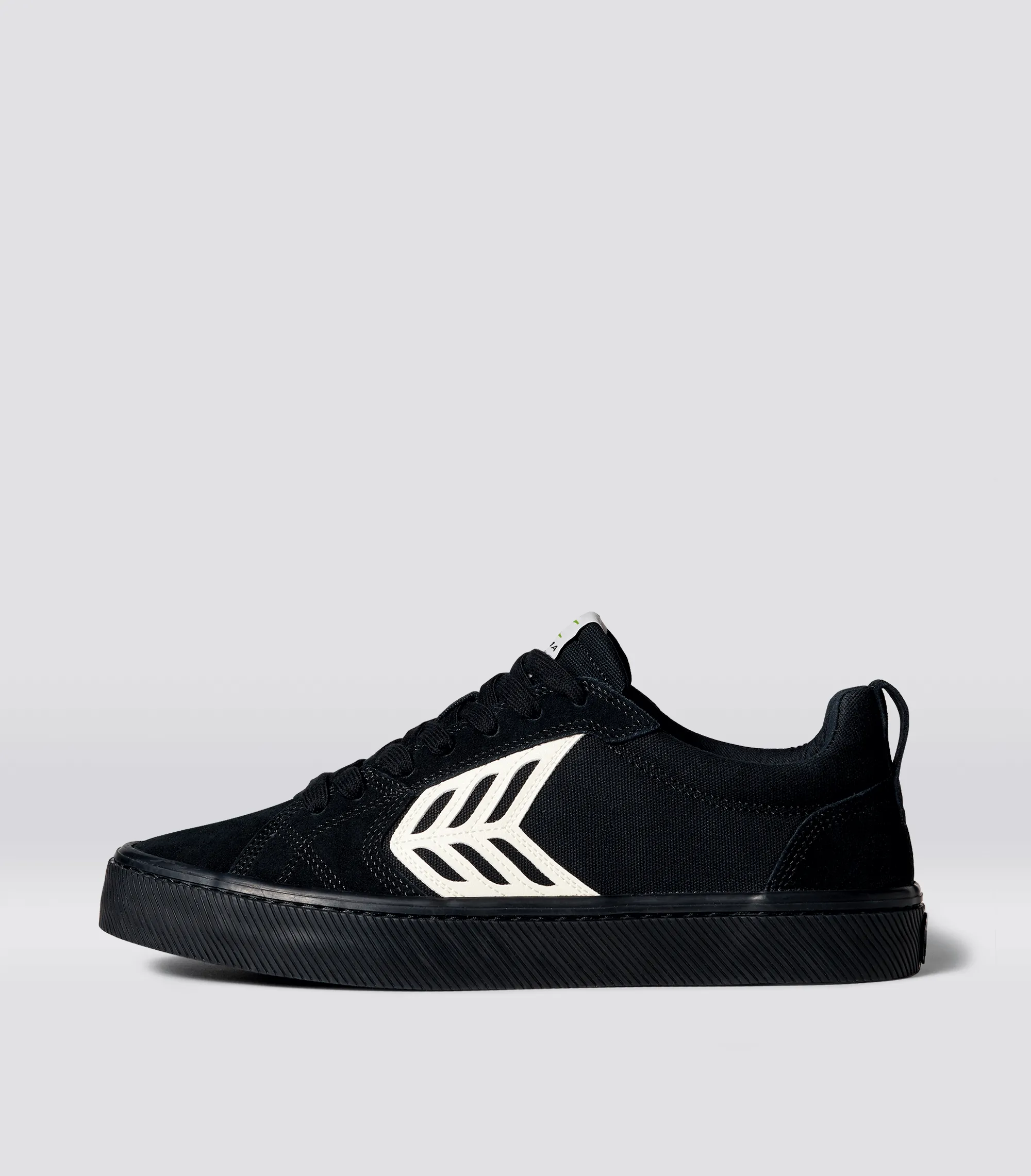 CATIBA PRO Low All Black Suede and Canvas Ivory Logo Sneaker Men Left sold by Cariuma