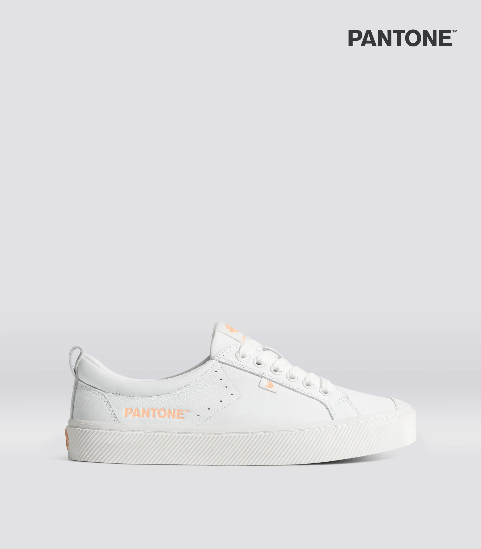 OCA Low Pantone White Premium Leather Peach Fuzz Sneaker Women sold by Cariuma