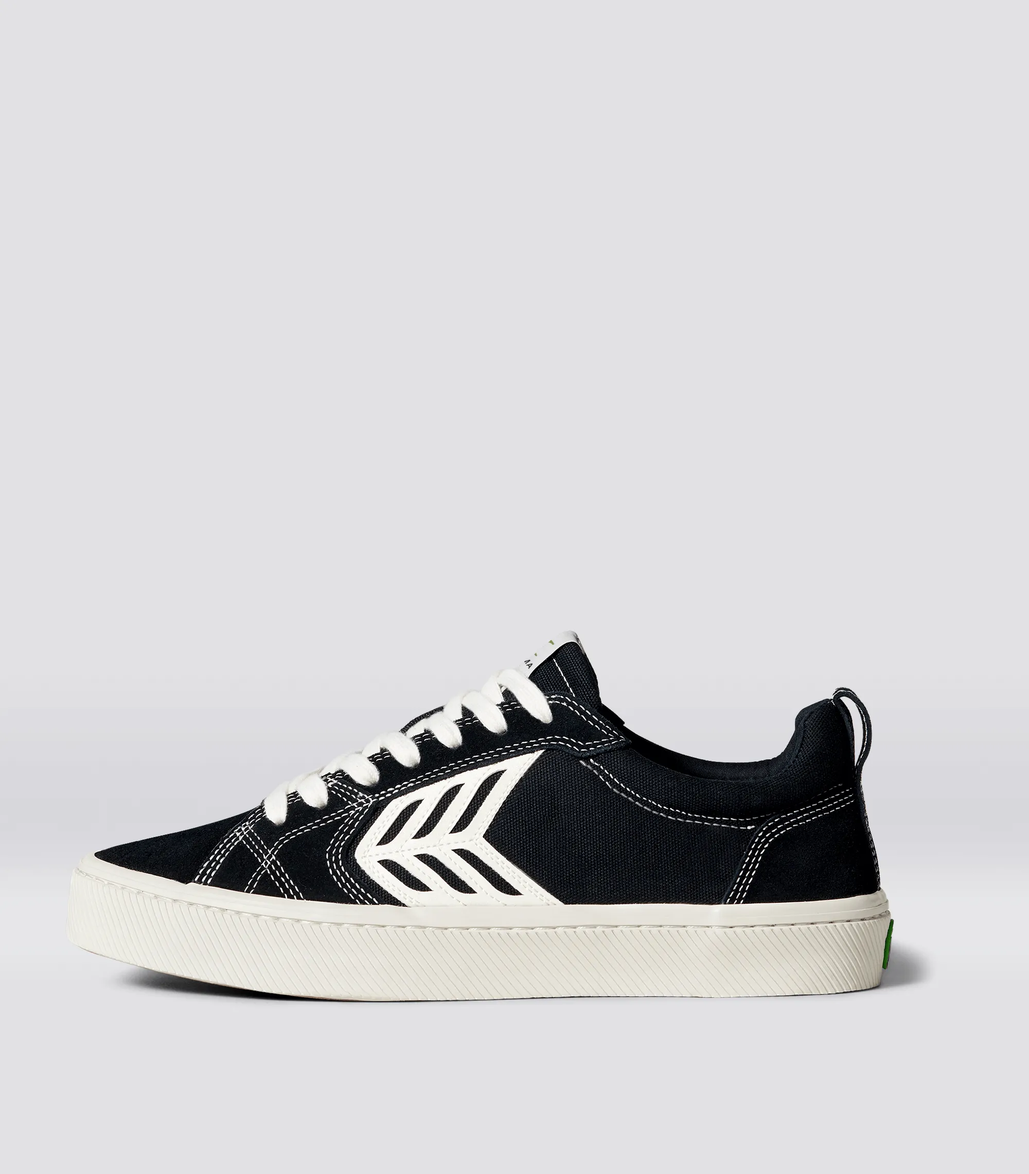 CATIBA PRO Low Black Suede and Canvas Contrast Thread Ivory Logo Sneaker Women Left sold by Cariuma