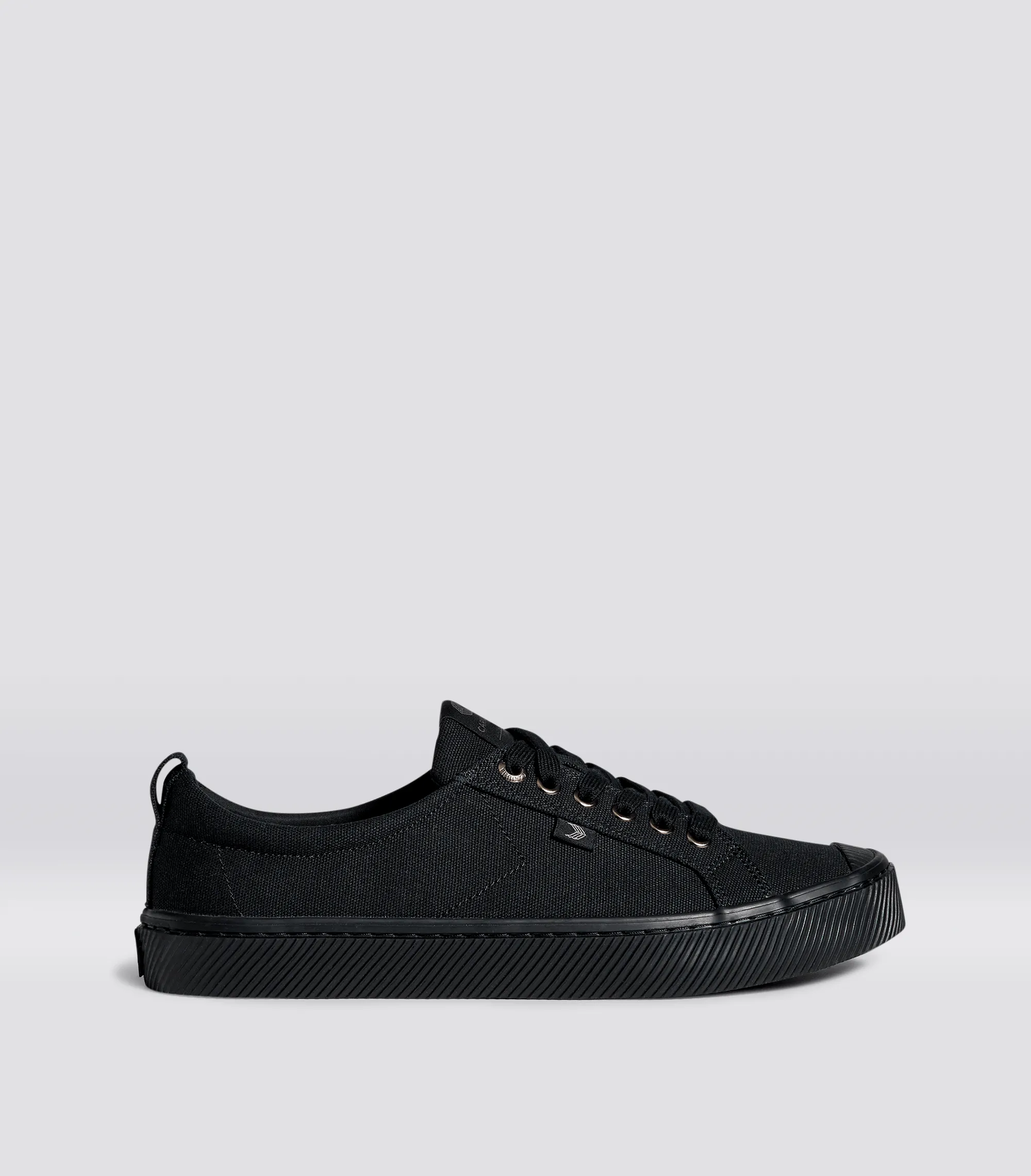 OCA Low All Black Canvas Sneaker Women sold by Cariuma