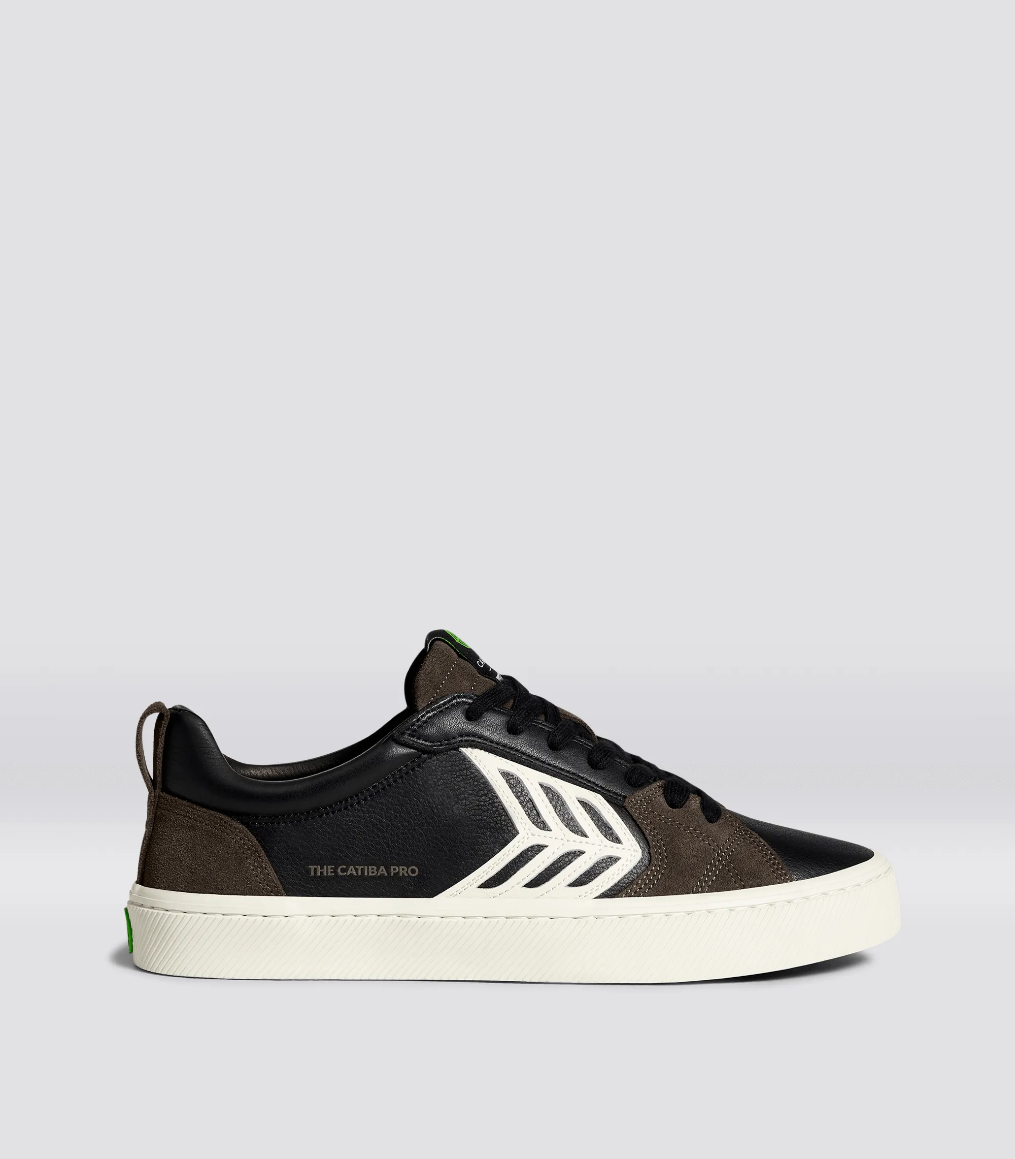 CATIBA PRO Low Black Premium Leather Dark Khaki Suede Ivory Logo Sneaker Women sold by Cariuma