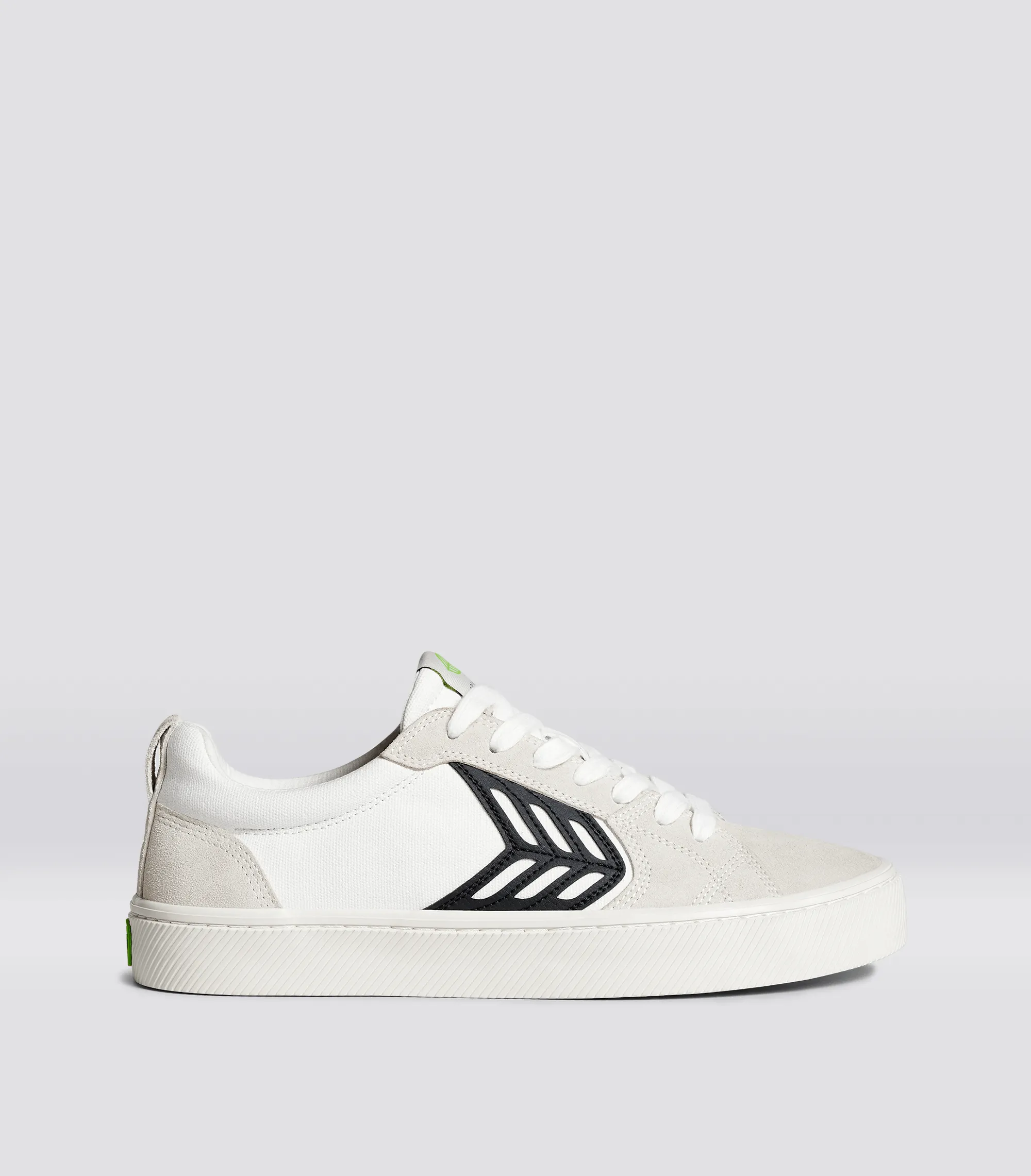 CATIBA PRO Low Off-White Canvas Vintage White Suede Black Logo Sneaker Men sold by Cariuma