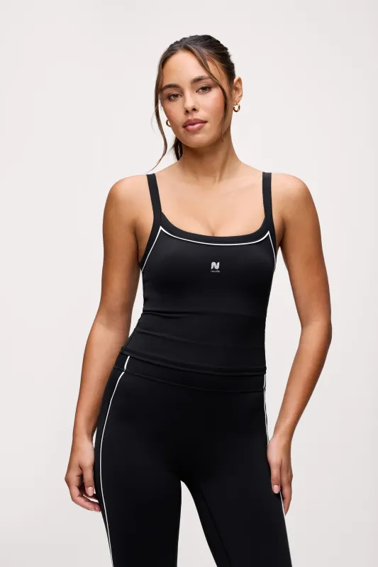 Motion Piped Tank | Black sold by nuuds