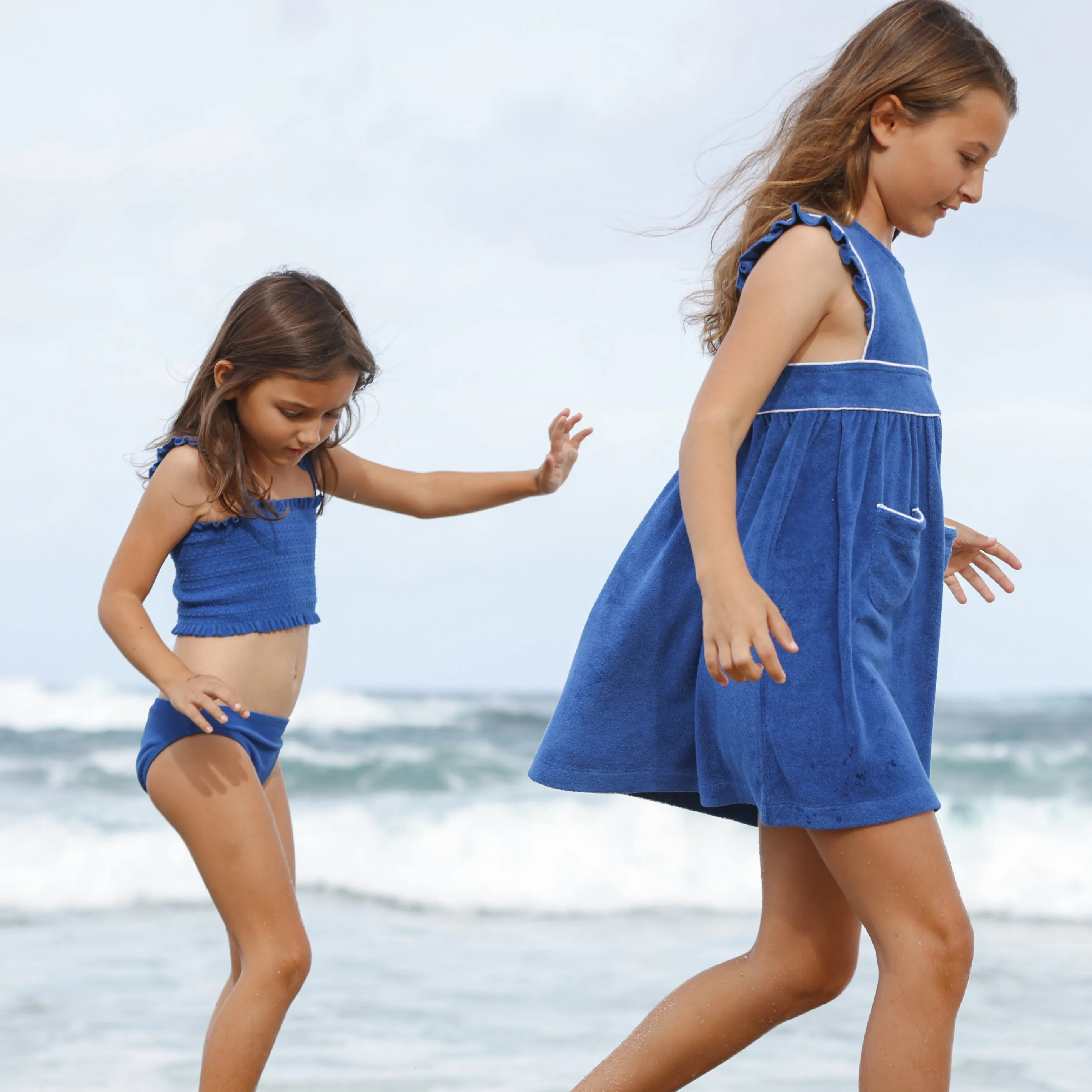 girls cove blue french terry ruffle sleeve pinafore dress sold by minnow product image thumbnail 2