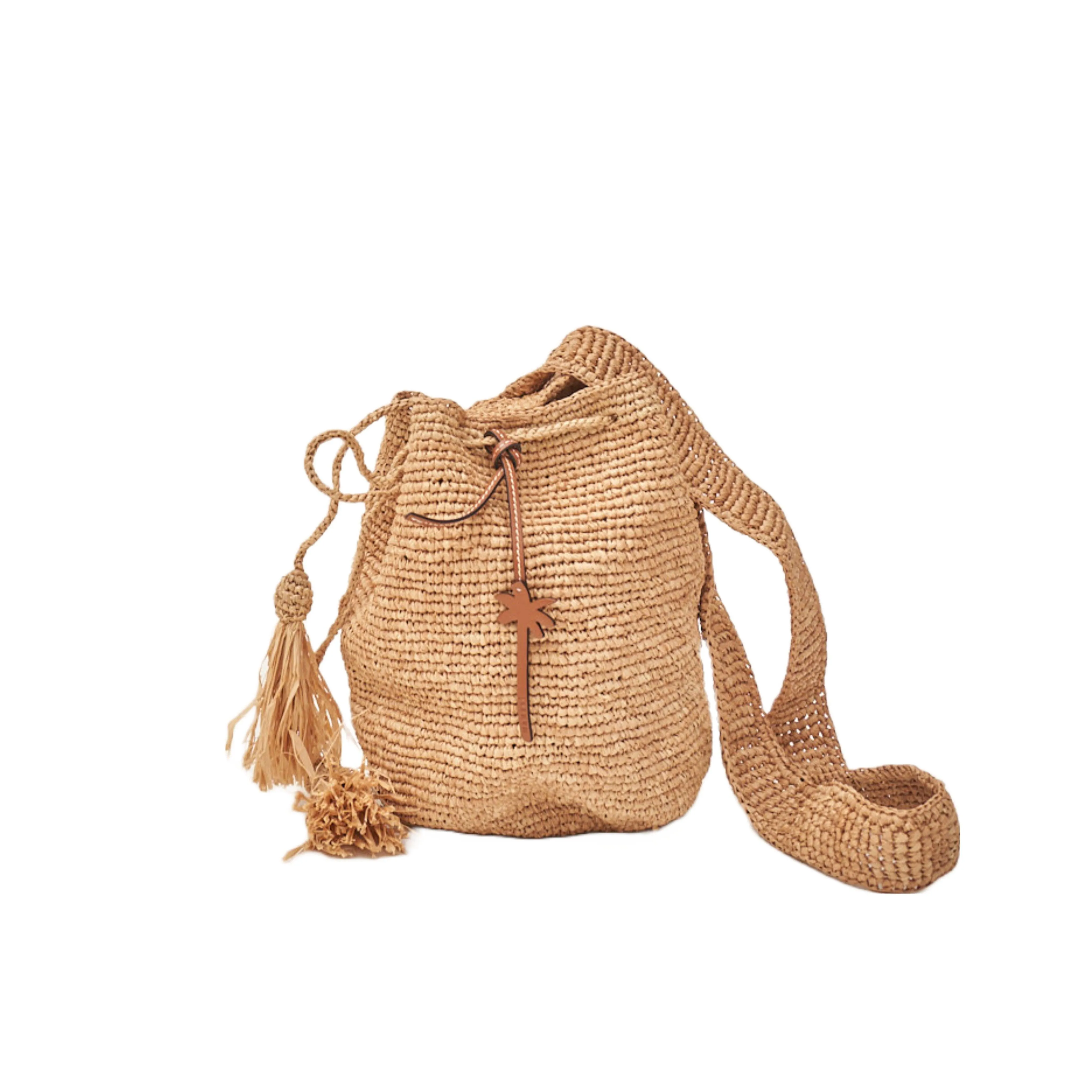 manebi tan raffia beach bucket sold by minnow