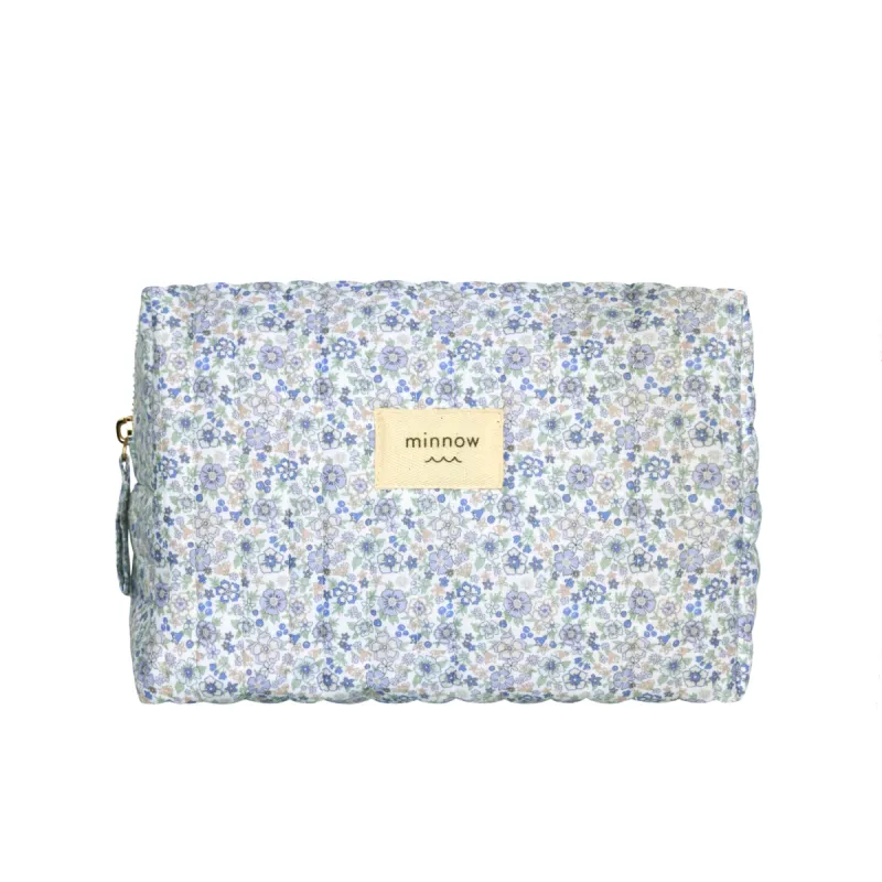 slate floral interior coated travel pouch sold by minnow