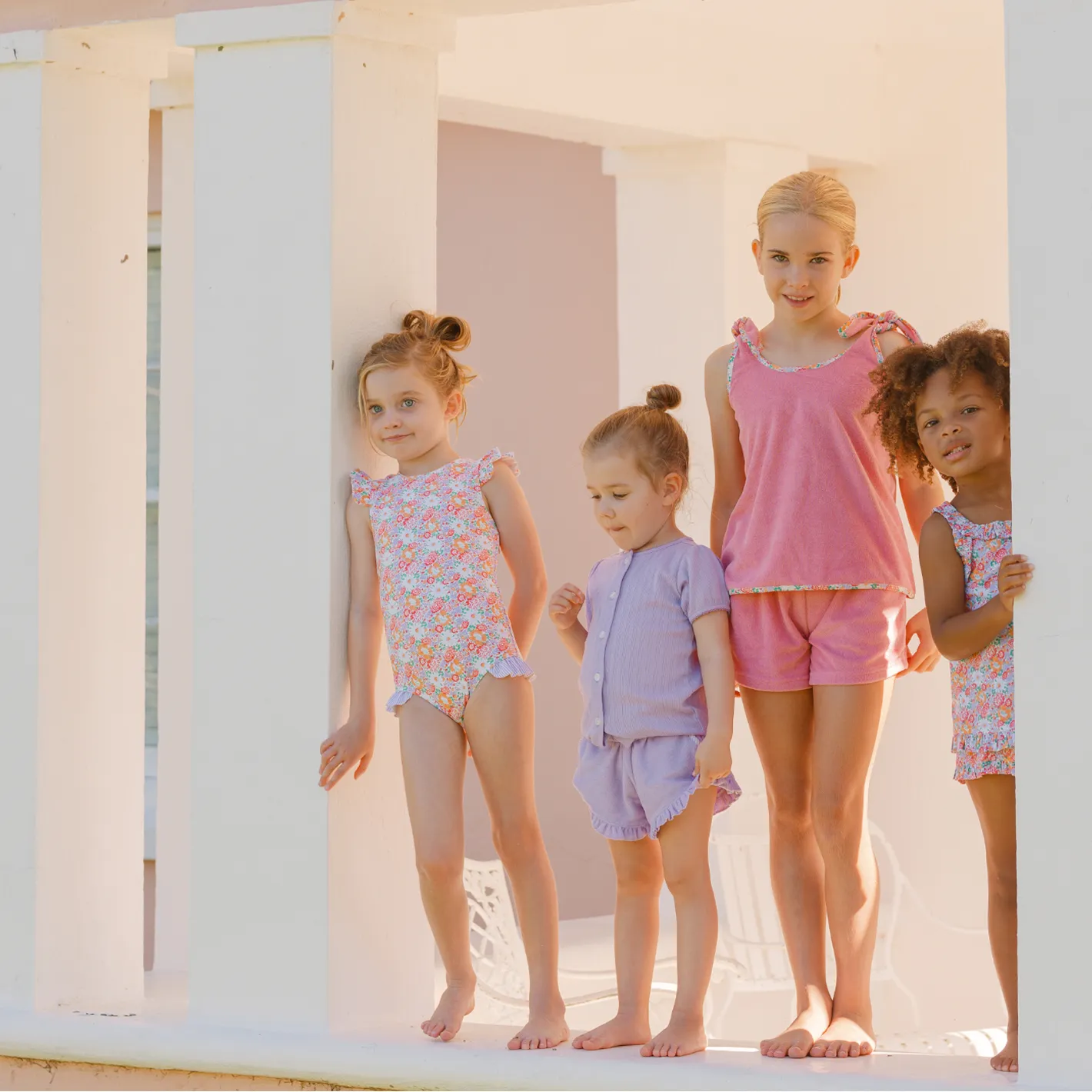 girls island blossom ruffle cap sleeve rashguard one piece sold by minnow product image thumbnail 3