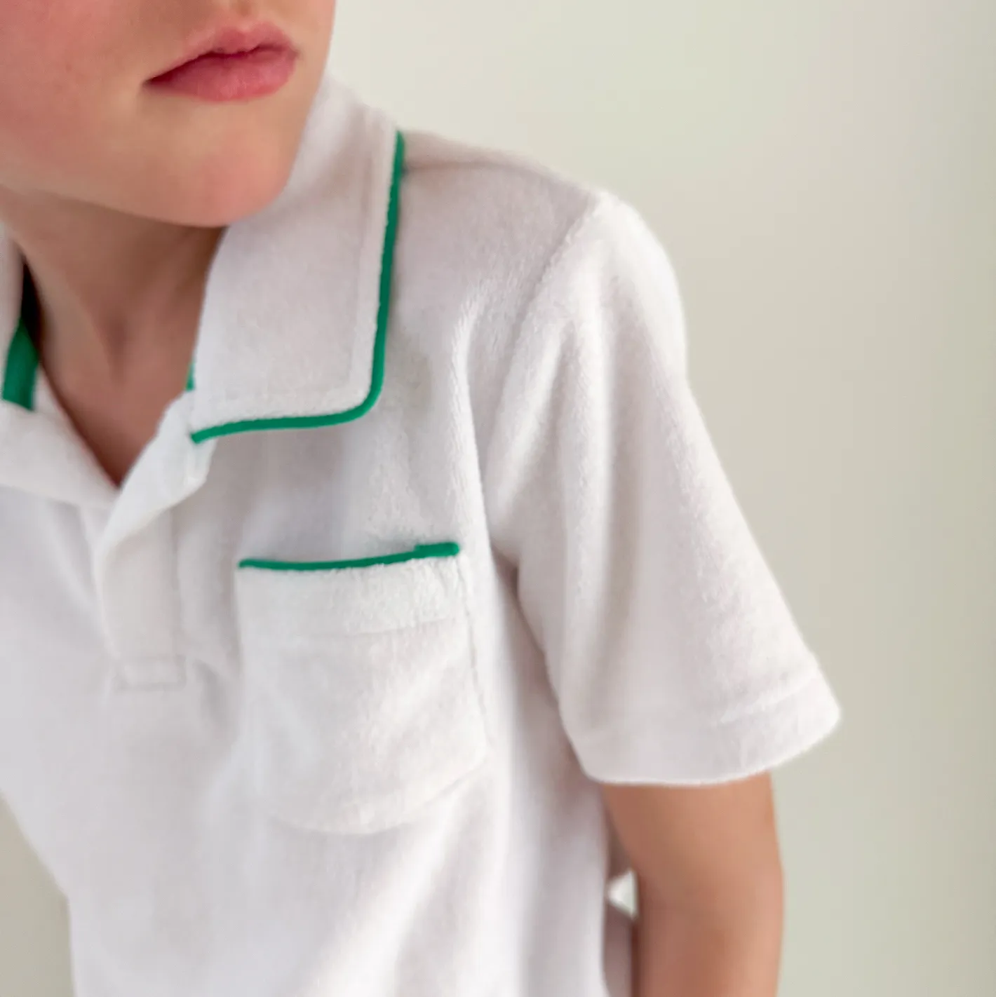 boys white french terry polo with bermuda green trim sold by minnow product image thumbnail 2