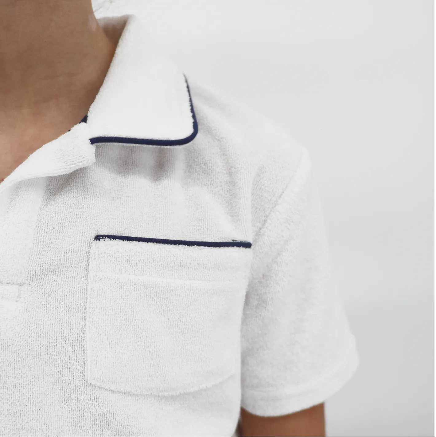 unisex white french terry polo with navy piping sold by minnow product image thumbnail 2