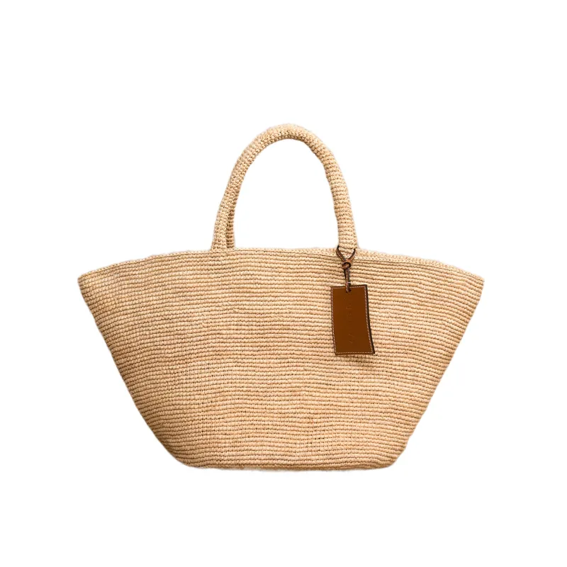 manebi natural raffia panier sold by minnow