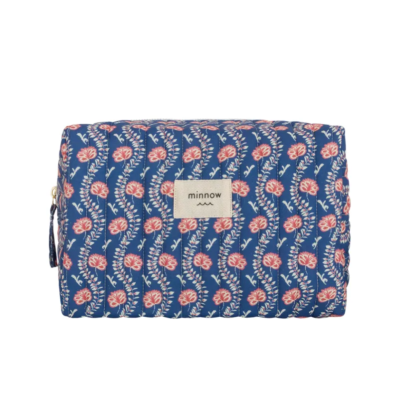 navy primrose interior coated travel pouch sold by minnow