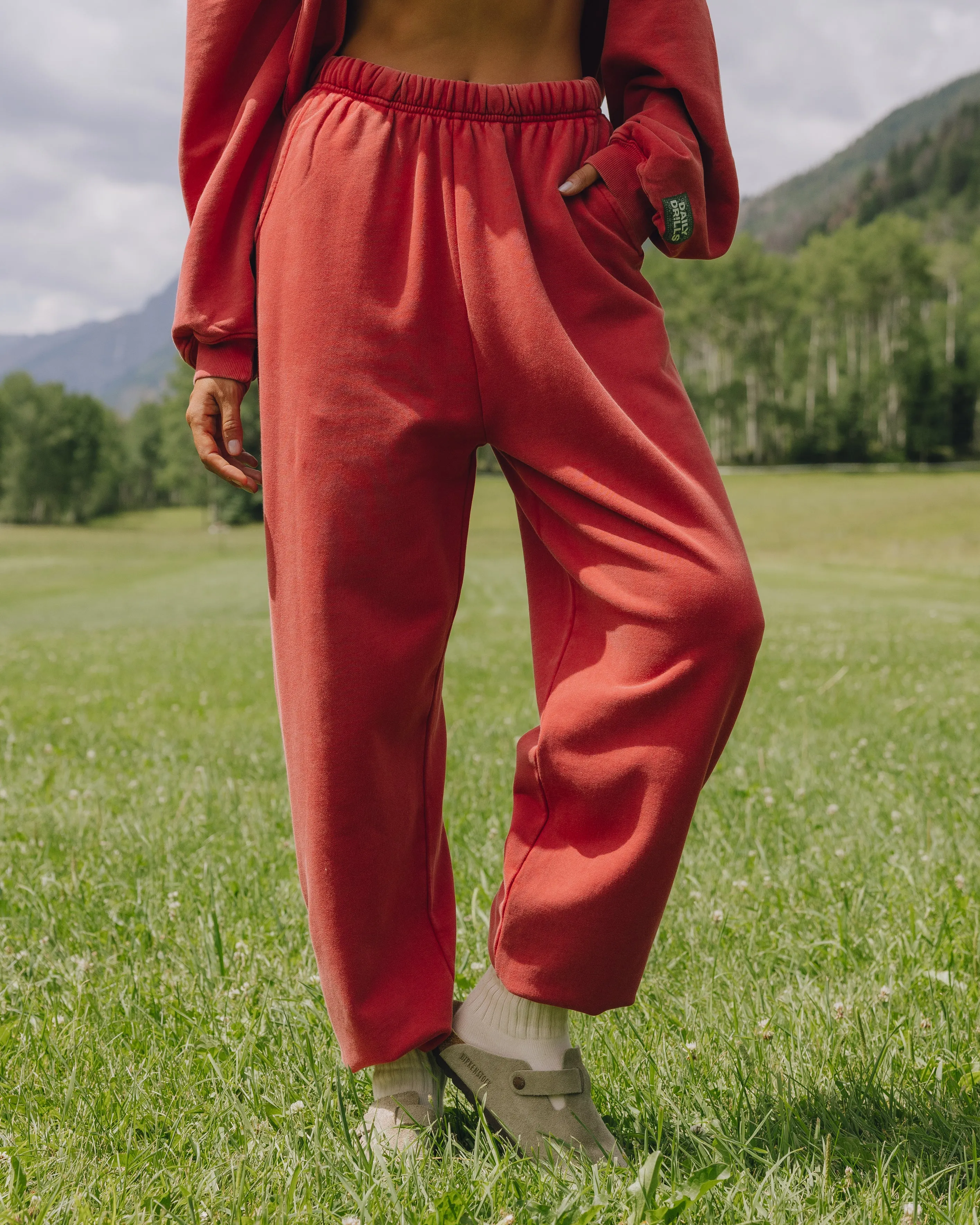Unisex Joggers - Sunbleached Vintage Red with Bandana Patch sold by Daily Drills
