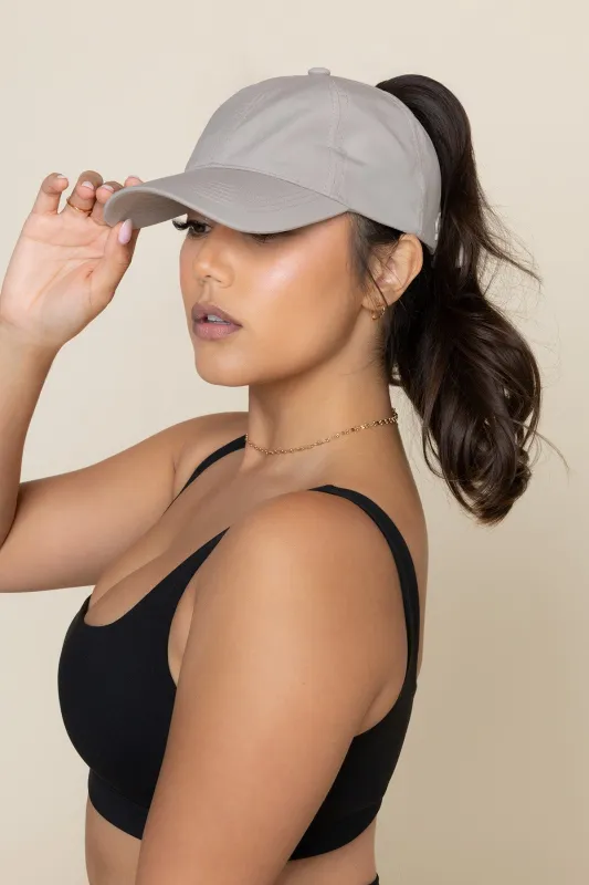 Go with the Bow High Ponytail Cap sold by POPFLEX