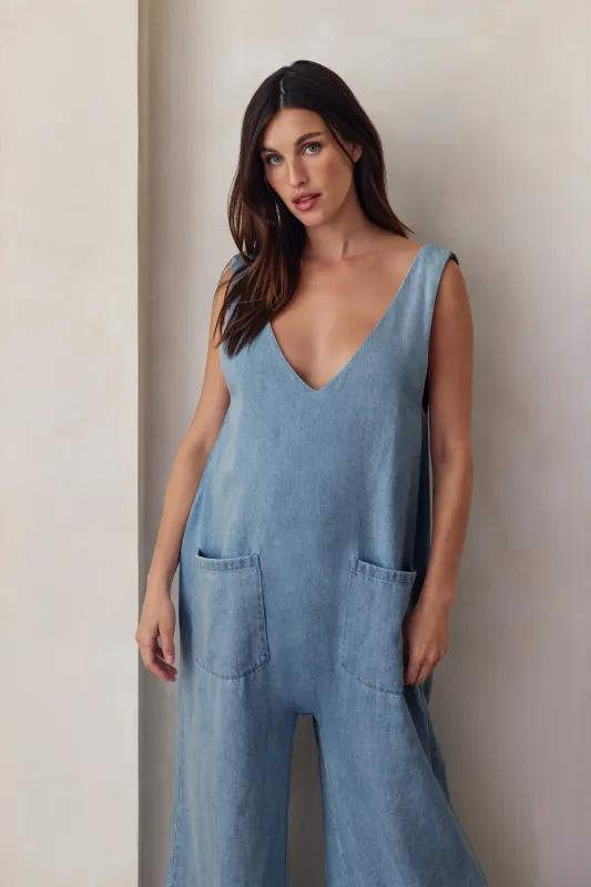 Denim Oversized Jumpsuit (Medium Blue) sold by Trunfio