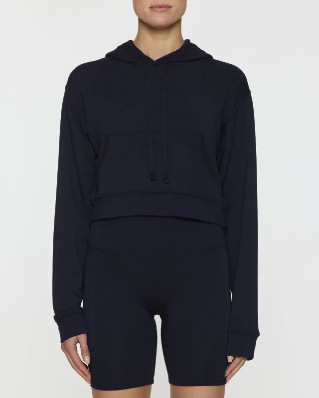 The Kaia Crop Skater Hoodie sold by Bleusalt