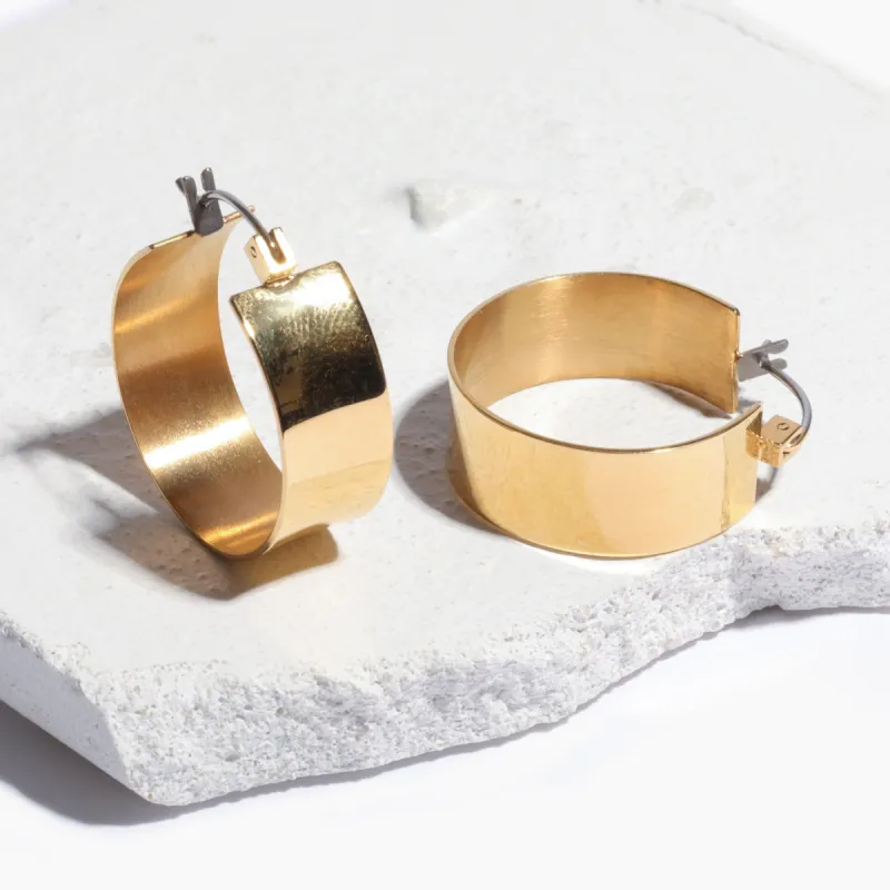 Round Trip Hoop Earrings sold by Tini Lux