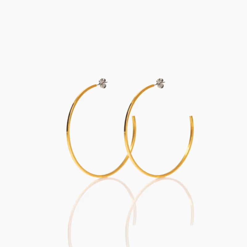 Iris Hoops sold by Tini Lux