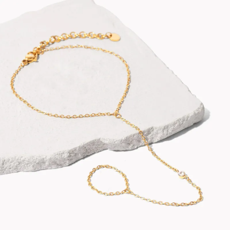 Indio Hand Chain sold by Tini Lux