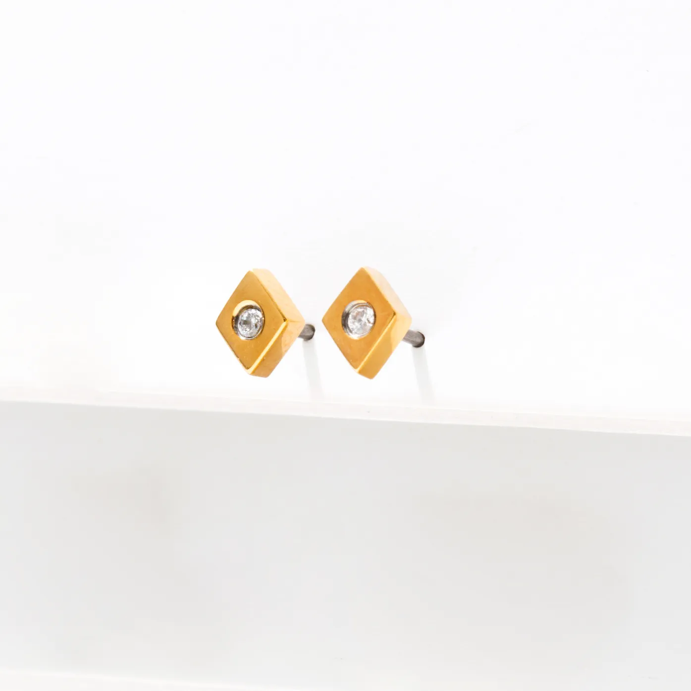 Diamond Ace Studs sold by Tini Lux