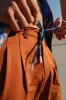 Traveler Pants (Rust) sold by Tombolo