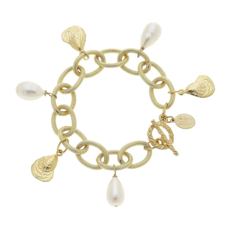 Pearl + Oyster Charm Bracelet sold by Susan Shaw