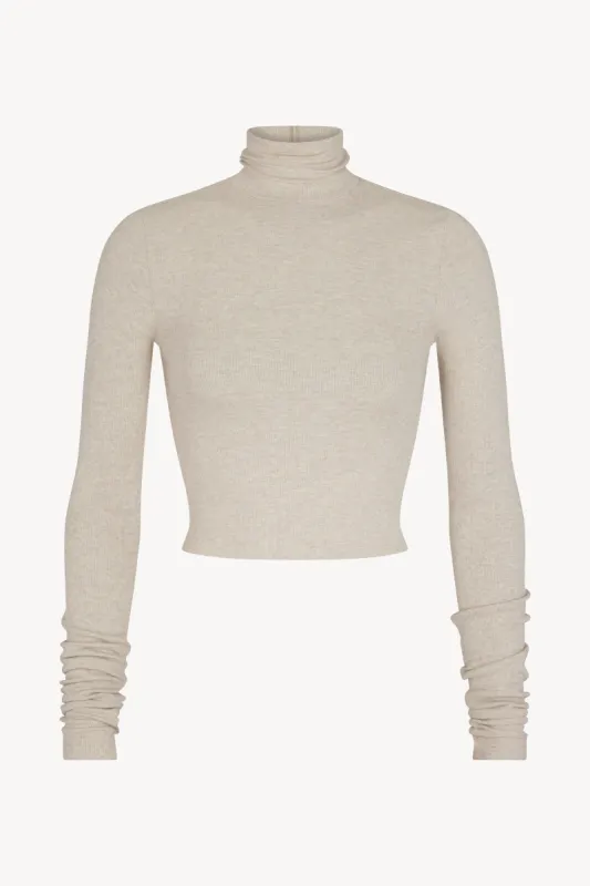 CROPPED FITTED TURTLENECK TOP sold by Eterne