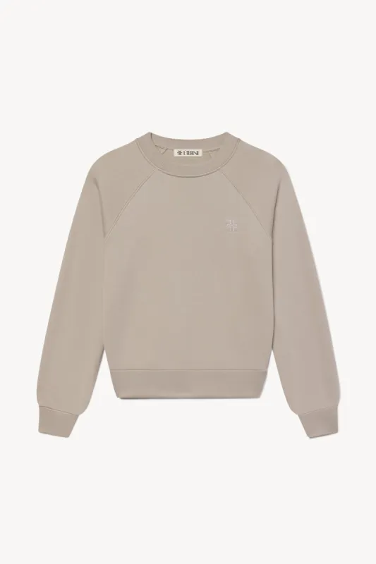 SHRUNKEN RAGLAN SWEATSHIRT sold by Eterne