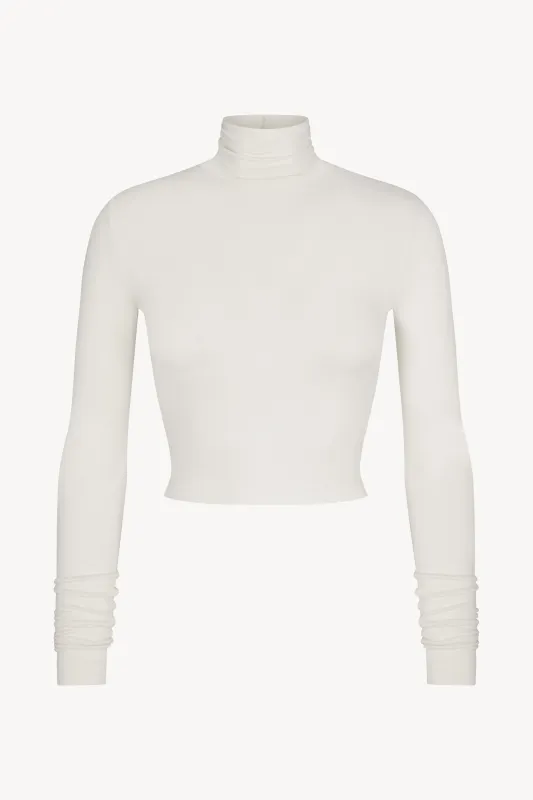 CROPPED FITTED TURTLENECK TOP sold by Eterne