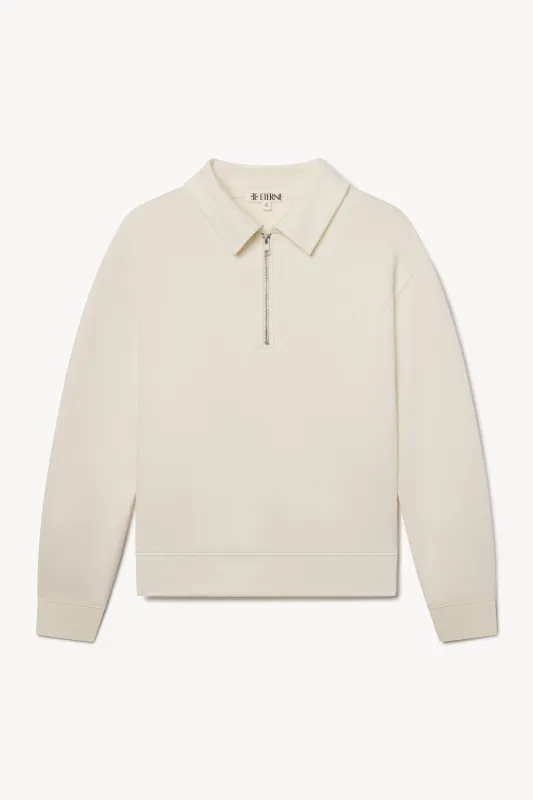ZIP-UP POLO SWEATSHIRT sold by Eterne