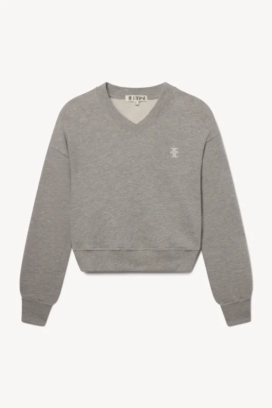 CROPPED V-NECK SWEATSHIRT sold by Eterne