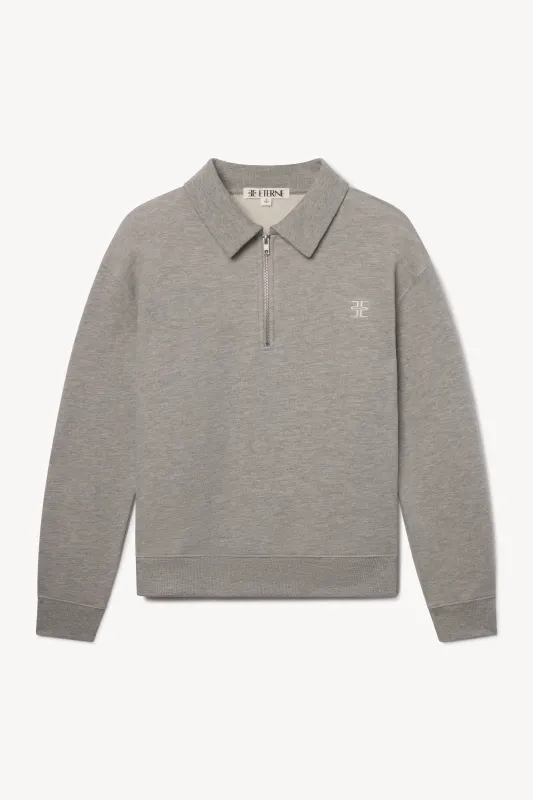 ZIP-UP POLO SWEATSHIRT sold by Eterne
