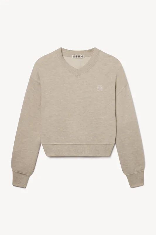 CROPPED V-NECK SWEATSHIRT sold by Eterne
