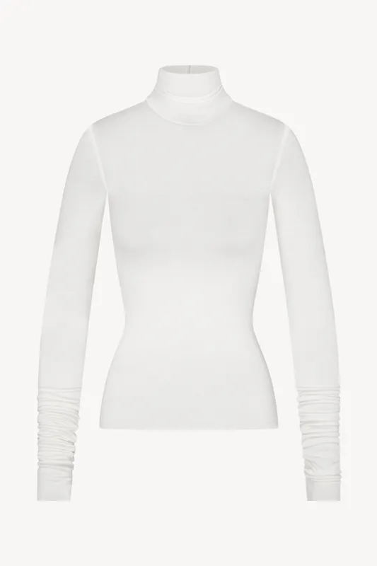 FITTED TURTLENECK TOP made by Eterne
