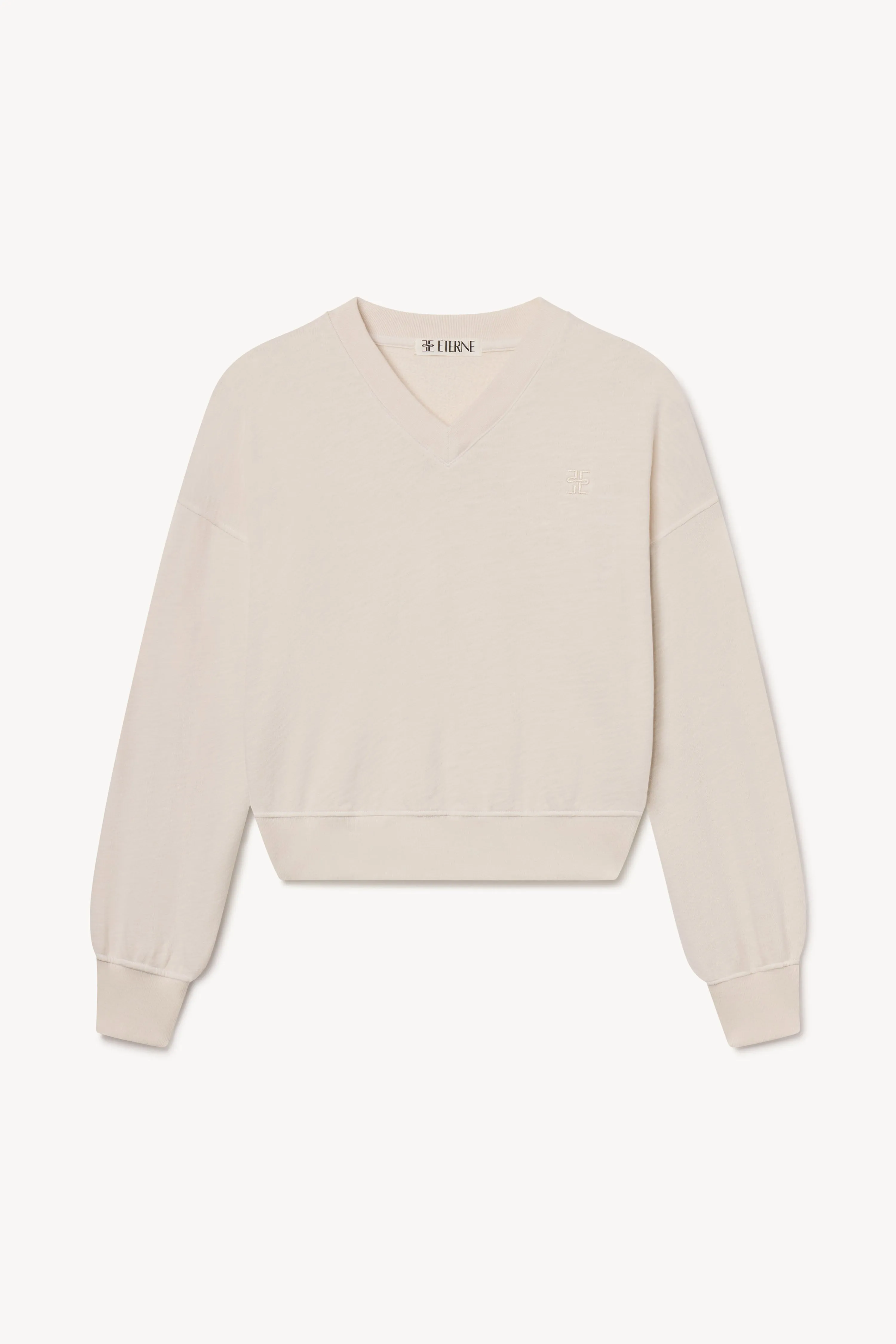 CROPPED V-NECK SWEATSHIRT sold by Eterne