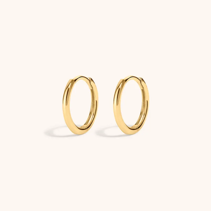 Classic Huggie Hoops in 14k Gold sold by Maison Miru