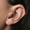 Tiny Diamond Studs in 14k Gold sold by Maison Miru
