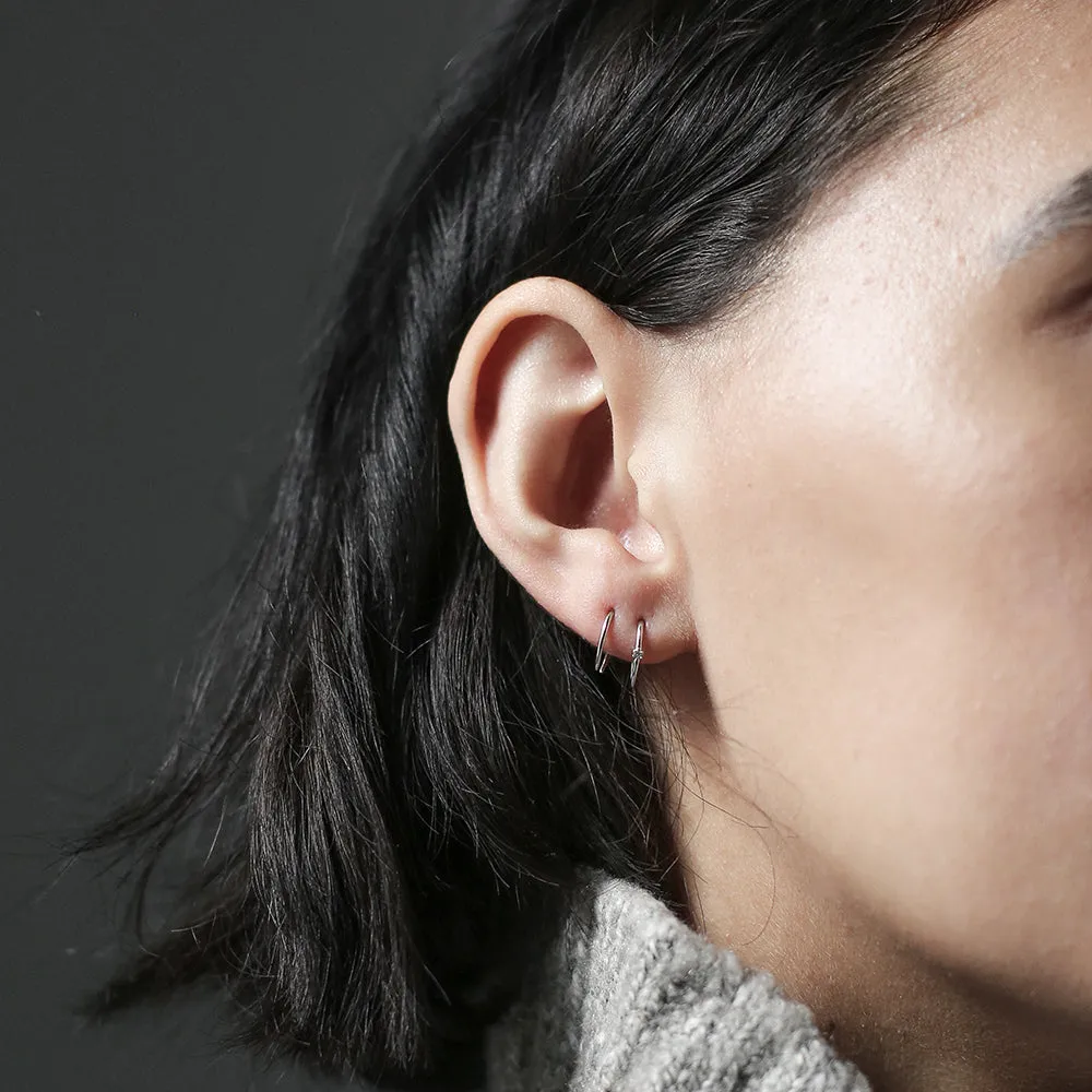 Sample Item: Shooting Star Open Hoop Earrings in Sterling Silver sold by Maison Miru product image thumbnail 4