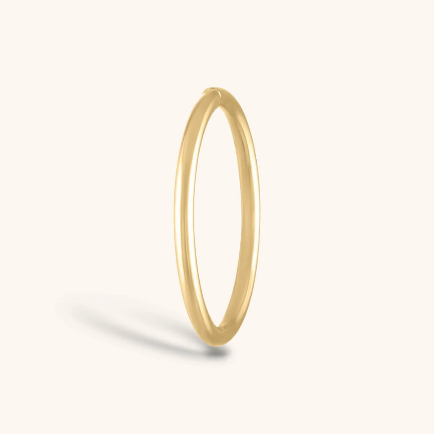 Forever Seamless Hoop in 14k Gold sold by Maison Miru