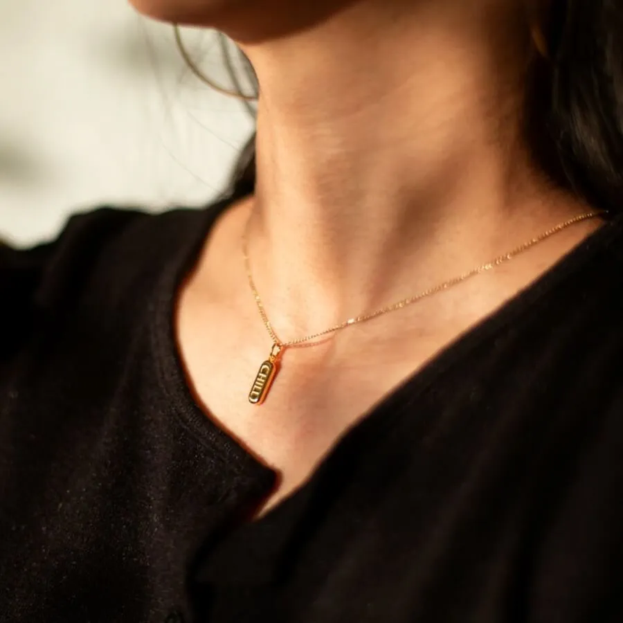 Sample Item: Chill Pill Charm Necklace in Sterling Silver sold by Maison Miru product image thumbnail 4